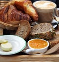 European breakfast Ã¢â¬â coffee, croissants, toasts, butter, jam Royalty Free Stock Photo